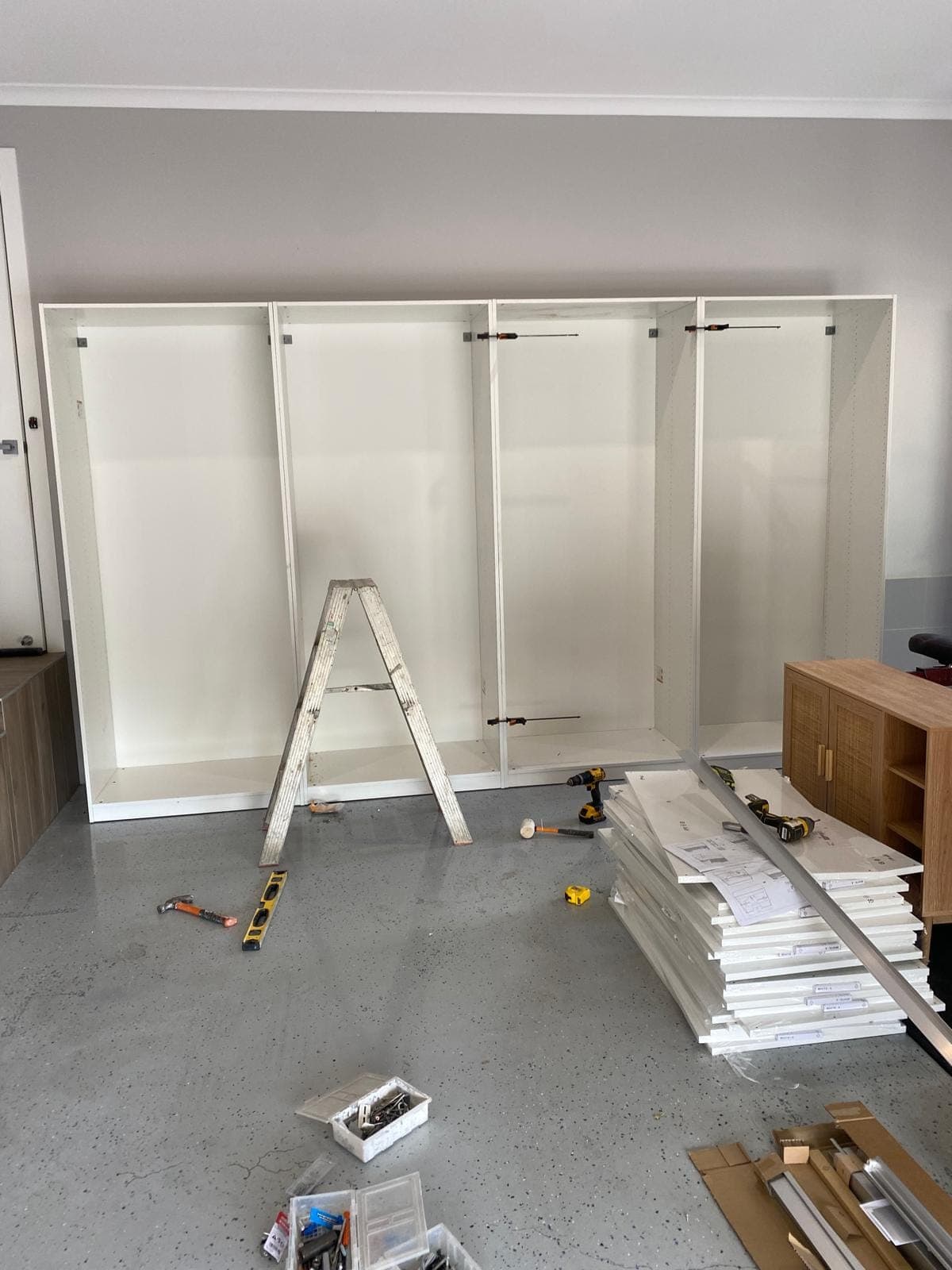 Renovation photo: built in wardrobe with sliding doors